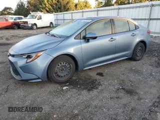 2021 Toyota Corolla LE with VIN JTDEPMAE1MJ144336, listed as a Copart auction lot 82373205 with 55,917 mi miles and Salvage title. Bid and sale history available at DreamBid. Image 1.