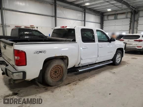 2013 Chevrolet Silverado 1500 LTZ с VIN 3GCPKTE24DG204077, выставлен на аукционе Copart как лот 87686625 с пробегом 214 161 миль миль и Списание • Salvage title. История ставок и продаж доступна на DreamBid. Изображение 3.