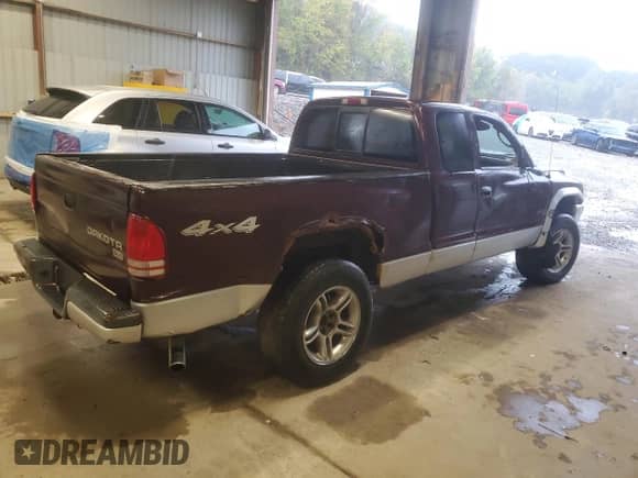 2004 Dodge Dakota SLT с VIN 1D7HG42N24S677145, выставлен на аукционе Copart как лот 81749255 с пробегом Не указан миль и Чистый • Clean title. История ставок и продаж доступна на DreamBid. Изображение 3.