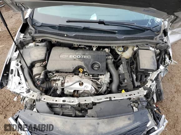 2018 Chevrolet Cruze LT с VIN 3G1BH6SE8JS650680, выставлен на аукционе Copart как лот 85450164 с пробегом 82 765 миль миль и Списание • Salvage title. История ставок и продаж доступна на DreamBid. Изображение 13.