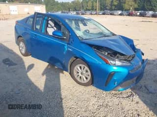 2021 Toyota Prius L Eco with VIN JTDKAMFU1M3136133, listed as a IAAI auction lot 43285926 with 49,911 mi miles and . Bid and sale history available at DreamBid. Image 1.