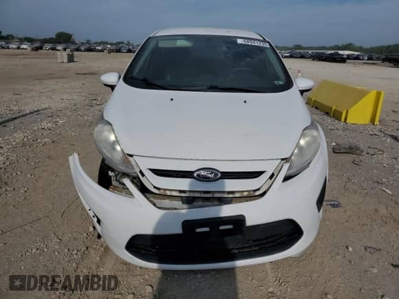 2013 Ford Fiesta S z VIN 3FADP4TJ1DM215310, wystawiony jako Copart lot #68941235 z przebiegiem 132 592 mil mil oraz Czysty tytuł • Clean title. Historia ofert i sprzedaży dostępna na DreamBid. Obrazek 5.