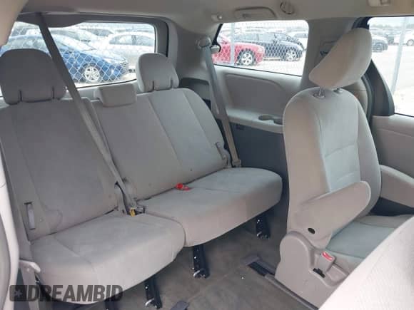 2015 Toyota Sienna L with VIN 5TDZK3DC6FS673338, listed as a IAAI auction lot 42497655 with 158,216 mi miles and . Bid and sale history available at DreamBid. Image 8.
