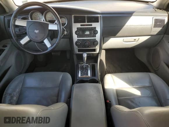 2006 Dodge Charger z VIN 2B3KA43G46H324046, wystawiony jako Copart lot #75922634 z przebiegiem 192 337 mil mil oraz Czysty tytuł • Clean title. Historia ofert i sprzedaży dostępna na DreamBid. Obrazek 8.