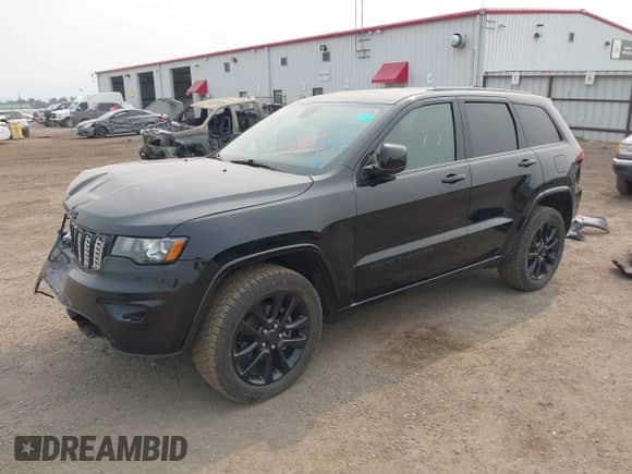 2020 Jeep Grand Cherokee Altitude with VIN 1C4RJFAG5LC424554, listed as a IAAI auction lot 43145424 with 57,858 mi miles and . Bid and sale history available at DreamBid. Image 21.