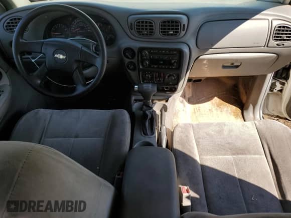 2006 Chevrolet TrailBlazer LS с VIN 1GNDT13S562254223, выставлен на аукционе Copart как лот 80241995 с пробегом 195 032 миль миль и Списание • Salvage title. История ставок и продаж доступна на DreamBid. Изображение 8.