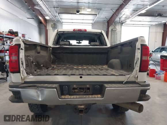 2016 Chevrolet Silverado 2500HD Work Truck with VIN 1GC1KUE80GF124569, listed as a IAAI auction lot 42915578 with 115,052 mi miles and . Bid and sale history available at DreamBid. Image 16.