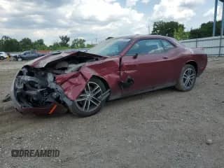2019 Dodge Challenger SXT with VIN 2C3CDZGG2KH712974, listed as a Copart auction lot 63704595 with 103,968 mi miles and Salvage title. Bid and sale history available at DreamBid. Image 1.