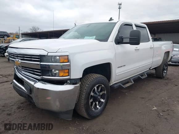 2015 Chevrolet Silverado 2500HD LT z VIN 1GC1KVEG6FF617734, wystawiony jako IAAI lot #41721265 z przebiegiem 165 445 mil mil oraz . Historia ofert i sprzedaży dostępna na DreamBid. Obrazek 2.