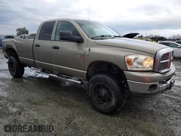 2009 Dodge 3500 SLT with VIN 3D7MX38L59G552041, listed as a Copart auction lot 84528754 with 234,666 mi miles and Salvage title. Bid and sale history available at DreamBid. Image 4.