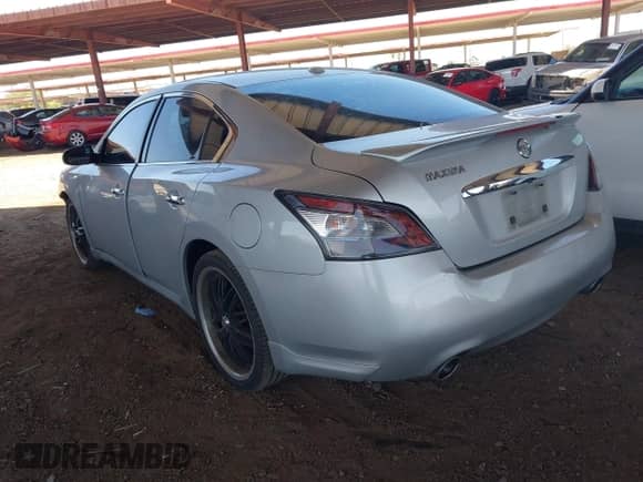 2014 Nissan Maxima SV with VIN 1N4AA5APXEC475581, listed as a IAAI auction lot 42554613 with 156,412 mi miles and . Bid and sale history available at DreamBid. Image 3.