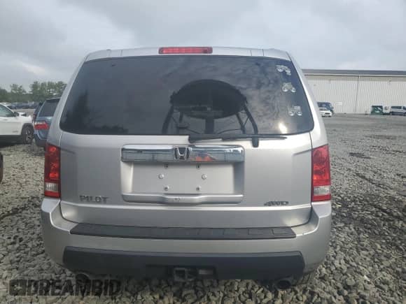 2010 Honda Pilot EX z VIN 5FNYF4H42AB002674, wystawiony jako Copart lot #68834325 z przebiegiem 264 651 mil mil oraz Szkoda całkowita • Salvage title. Historia ofert i sprzedaży dostępna na DreamBid. Obrazek 6.