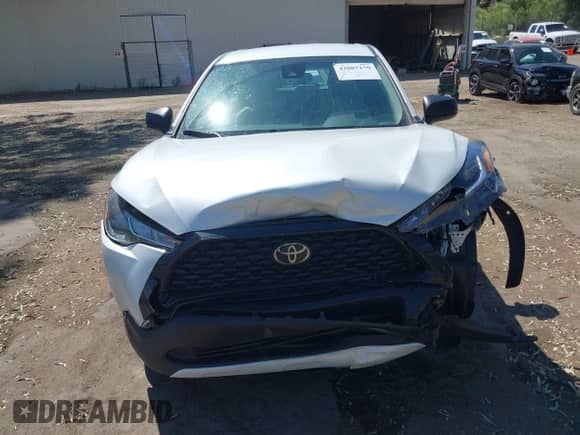 2022 Toyota Corolla Cross L with VIN 7MUAAABG8NV029483, listed as a IAAI auction lot 42687179 with 49,403 mi miles and . Bid and sale history available at DreamBid. Image 12.