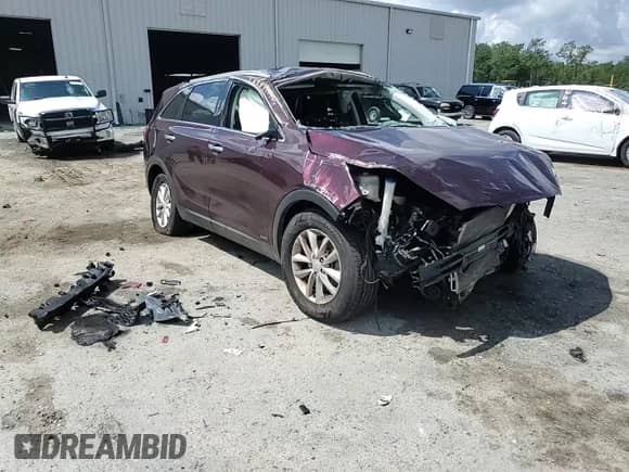 2018 Kia Sorento LX z VIN 5XYPGDA30JG377045, wystawiony jako Copart lot #70025135 z przebiegiem Nie podano mil oraz Nie do naprawy • Non repairable. Historia ofert i sprzedaży dostępna na DreamBid. Obrazek 14.