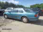 1991 Honda Accord with VIN 1HGCB7269MA071166, listed as a Copart auction lot 56202235 with 107,136 mi miles and Salvage title. Bid and sale history available at DreamBid. Image 2.