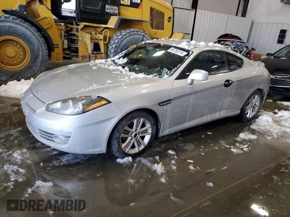 2008 Hyundai Tiburon GS с VIN KMHHM66D68U292449, выставлен на аукционе Copart как лот 86752214 с пробегом 251 711 миль миль и Списание • Salvage title. История ставок и продаж доступна на DreamBid. Изображение 1.