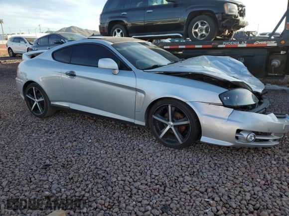 2004 Hyundai Tiburon GT с VIN KMHHN65F44U130202, выставлен на аукционе Copart как лот 43193404 с пробегом 207 694 миль миль и Списание • Salvage title. История ставок и продаж доступна на DreamBid. Изображение 4.