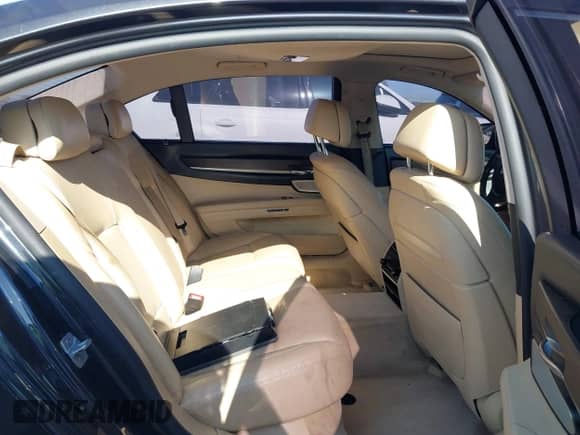 2013 BMW 7 Series 750Li xDrive with VIN WBAYF8C58DD141658, listed as a IAAI auction lot 42327776 with 130,428 mi miles and . Bid and sale history available at DreamBid. Image 8.