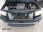 2013 Toyota Tundra z VIN 5TFUM5F1XDX046077, wystawiony jako Copart lot #65893365 z przebiegiem 240 153 mil mil oraz Szkoda całkowita • Salvage title. Historia ofert i sprzedaży dostępna na DreamBid. Obrazek 11.
