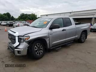 2018 Toyota Tundra SR с VIN 5TFUY5F12JX698790, выставлен на аукционе Copart как лот 65143495 с пробегом Не указан миль и Списание • Salvage title. История ставок и продаж доступна на DreamBid. Изображение 1.
