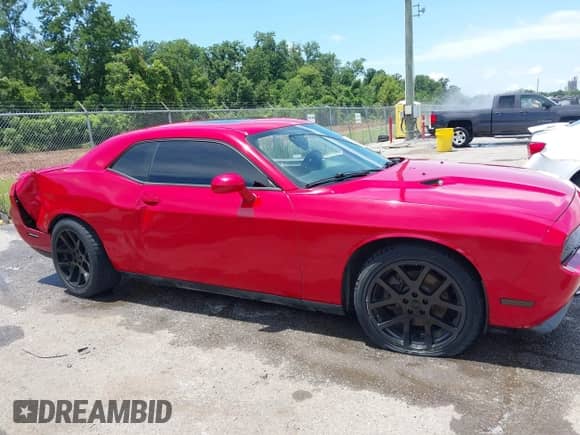 2013 Dodge Challenger R/T Plus z VIN 2C3CDYBT8DH614369, wystawiony jako IAAI lot #42684383 z przebiegiem 82 766 mil mil oraz . Historia ofert i sprzedaży dostępna na DreamBid. Obrazek 13.
