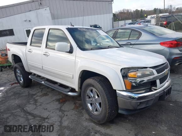 2012 Chevrolet Colorado 2LT z VIN 1GCHSDFE4C8127797, wystawiony jako IAAI lot #41753806 z przebiegiem 166 381 mil mil oraz . Historia ofert i sprzedaży dostępna na DreamBid. Obrazek 1.