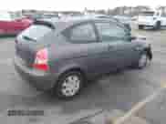 2010 Hyundai Accent Blue z VIN KMHCM3AC1AU158686, wystawiony jako IAAI lot #41466819 z przebiegiem 142 241 mil mil oraz . Historia ofert i sprzedaży dostępna na DreamBid. Obrazek 4.