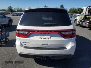 2023 Dodge Durango Pursuit с VIN 1C4RDJFG5PC631227, выставлен на аукционе Copart как лот 86140905 с пробегом 59 956 миль миль и Чистый • Clean title. История ставок и продаж доступна на DreamBid. Изображение 6.