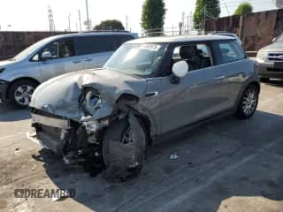 2015 MINI Hardtop with VIN WMWXM5C5XFT938115, listed as a Copart auction lot 64882875 with 88,144 mi miles and Salvage title. Bid and sale history available at DreamBid. Image 1.