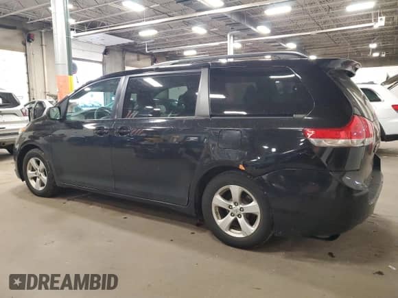 2013 Toyota Sienna LE AAS with VIN 5TDKK3DC9DS391564, listed as a Copart auction lot 82652825 with 194,558 mi miles and Salvage title. Bid and sale history available at DreamBid. Image 2.