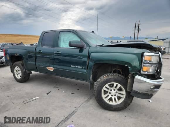 2015 Chevrolet Silverado 1500 LT with VIN 1GCVKREC5FZ365818, listed as a Copart auction lot 70578615 with 107,343 mi miles and Salvage title. Bid and sale history available at DreamBid. Image 4.