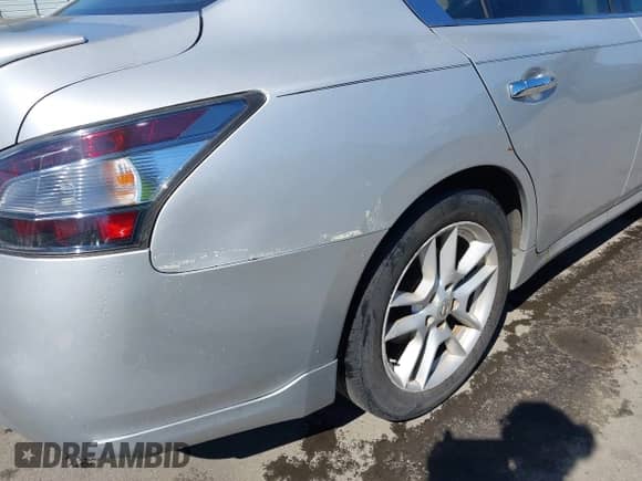 2012 Nissan Maxima SV z VIN 1N4AA5APXCC825854, wystawiony jako IAAI lot #43452666 z przebiegiem 231 557 mil mil oraz . Historia ofert i sprzedaży dostępna na DreamBid. Obrazek 6.