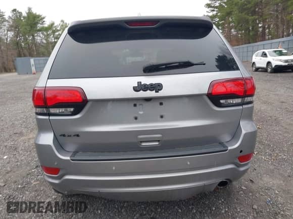 2019 Jeep Grand Cherokee Laredo E with VIN 1C4RJFAG7KC853886, listed as a IAAI auction lot 42013214 with 84,836 mi miles and . Bid and sale history available at DreamBid. Image 16.