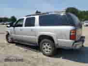 2004 Chevrolet Suburban Z71 z VIN 3GNFK16Z74G305505, wystawiony jako Copart lot #68907834 z przebiegiem Nie podano mil oraz Szkoda całkowita • Salvage title. Historia ofert i sprzedaży dostępna na DreamBid. Obrazek 2.