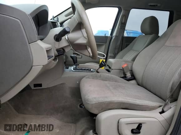 2005 Jeep Grand Cherokee Laredo with VIN 1J4GS48KX5C563594, listed as a Copart auction lot 69724645 with 189,716 mi miles and Salvage title. Bid and sale history available at DreamBid. Image 7.