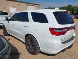2018 Dodge Durango SRT with VIN 1C4SDJGJXJC194764, listed as a IAAI auction lot 43129897 with 141,886 mi miles and . Bid and sale history available at DreamBid. Image 3.