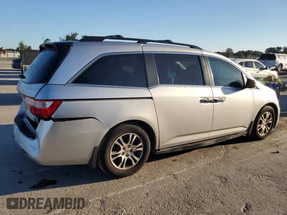 2013 Honda Odyssey EX-L z VIN 5FNRL5H63DB042917, wystawiony jako Copart lot #86450745 z przebiegiem 223 098 mil mil oraz Szkoda całkowita • Salvage title. Historia ofert i sprzedaży dostępna na DreamBid. Obrazek 3.