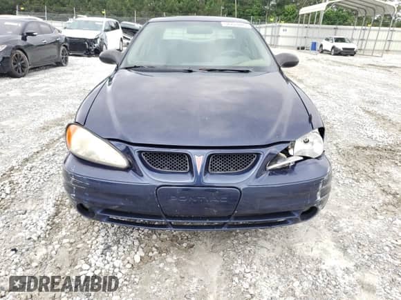 2004 Pontiac Grand Am SE with VIN 1G2NE52F04M573148, listed as a Copart auction lot 58763885 with 160,559 mi miles and Salvage title. Bid and sale history available at DreamBid. Image 5.
