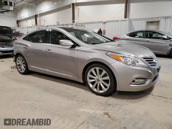 2013 Hyundai Azera с VIN KMHFH4JG7DA329652, выставлен на аукционе Copart как лот 74567364 с пробегом 136 578 миль миль и Чистый • Clean title. История ставок и продаж доступна на DreamBid. Изображение 4.