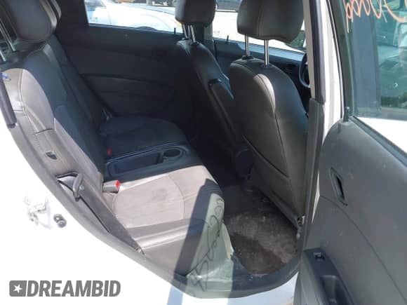 2014 Chevrolet Spark LS with VIN KL8CA6S91EC592354, listed as a IAAI auction lot 42856222 with 133,498 mi miles and . Bid and sale history available at DreamBid. Image 8.