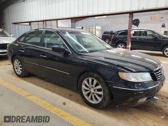 2007 Hyundai Azera SE с VIN KMHFC46F57A190303, выставлен на аукционе Copart как лот 87173494 с пробегом 121 463 миль миль и Списание • Salvage title. История ставок и продаж доступна на DreamBid. Изображение 4.