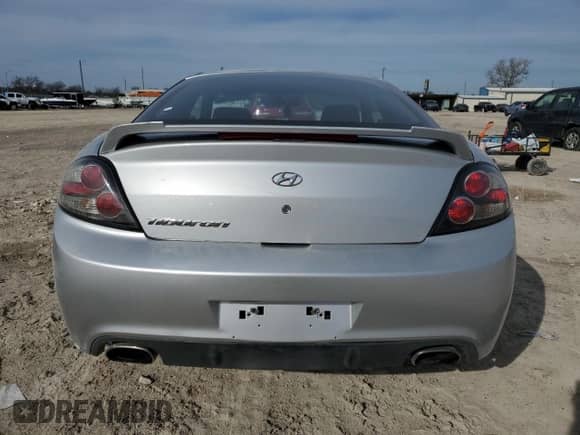 2008 Hyundai Tiburon GS с VIN KMHHM66D68U296212, выставлен на аукционе Copart как лот 88536725 с пробегом 116 240 миль миль и Списание • Salvage title. История ставок и продаж доступна на DreamBid. Изображение 6.