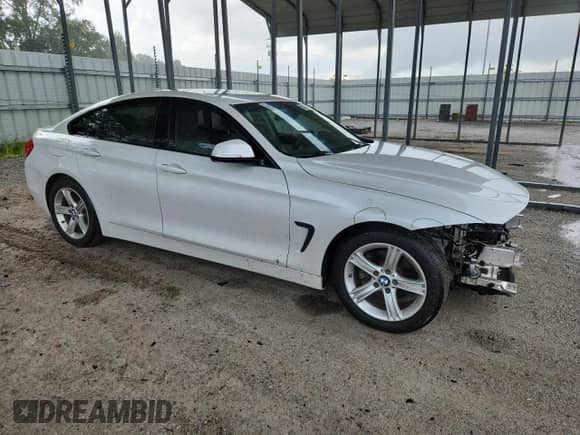 2015 BMW 4 Series 428i z VIN WBA4A5C52FD410672, wystawiony jako Copart lot #66146915 z przebiegiem 65 457 mil mil oraz Szkoda całkowita • Salvage title. Historia ofert i sprzedaży dostępna na DreamBid. Obrazek 4.
