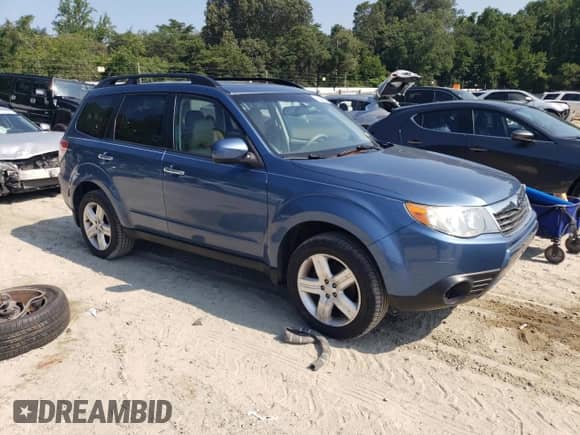 2009 Subaru Forester X with VIN JF2SH63669G749010, listed as a Copart auction lot 66628685 with 105,388 mi miles and Salvage title. Bid and sale history available at DreamBid. Image 4.