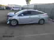 2021 Toyota Prius LE with VIN JTDKAMFP9M3166300, listed as a IAAI auction lot 43400137 with 64,301 mi miles and . Bid and sale history available at DreamBid. Image 14.