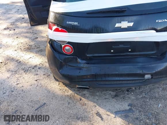 2013 Chevrolet Sonic RS z VIN 1G1JH6SB9D4176972, wystawiony jako IAAI lot #42191316 z przebiegiem 85 102 mil mil oraz . Historia ofert i sprzedaży dostępna na DreamBid. Obrazek 12.