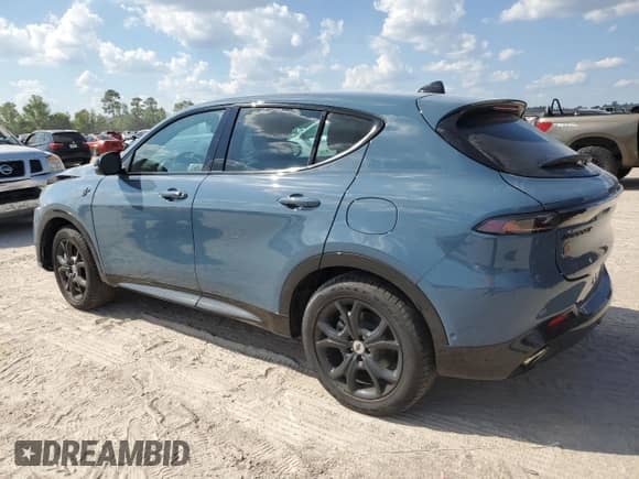 2024 Dodge Hornet R/T Plus с VIN ZACPDFDW6R3A22300, выставлен на аукционе Copart как лот 69647344 с пробегом Не указан миль и Списание • Salvage title. История ставок и продаж доступна на DreamBid. Изображение 2.