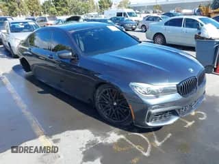 2019 BMW 7 Series 740i z VIN WBA7E2C57KB454950, wystawiony jako IAAI lot #43163381 z przebiegiem 100 798 mil mil oraz . Historia ofert i sprzedaży dostępna na DreamBid. Obrazek 1.