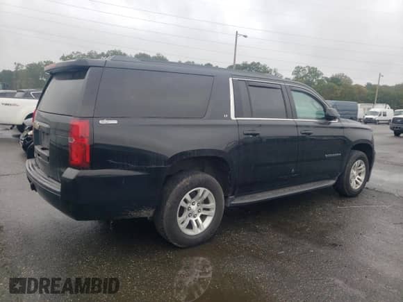 2019 Chevrolet Suburban LT с VIN 1GNSKHKC2KR142140, выставлен на аукционе Copart как лот 81406415 с пробегом 75 496 миль миль и Чистый • Clean title. История ставок и продаж доступна на DreamBid. Изображение 3.