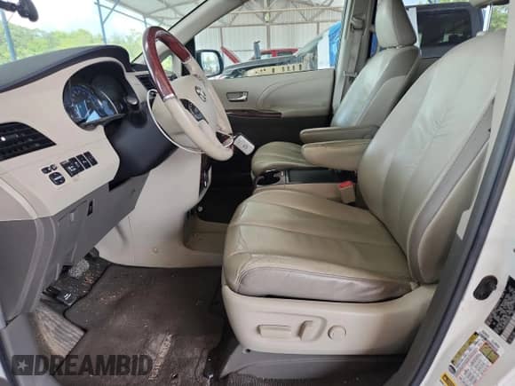 2011 Toyota Sienna XLE AAS with VIN 5TDYK3DC0BS003886, listed as a Copart auction lot 63451285 with 194,247 mi miles and Salvage title. Bid and sale history available at DreamBid. Image 7.